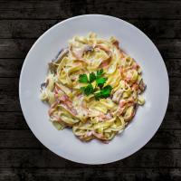 Spaghetti carbonara with parmesan