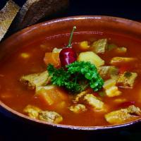 Poultry soup with noodles and Iberian ham extract